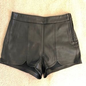 Black faux leather shorts